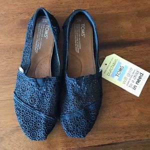Brand new!!! Never worn toms!